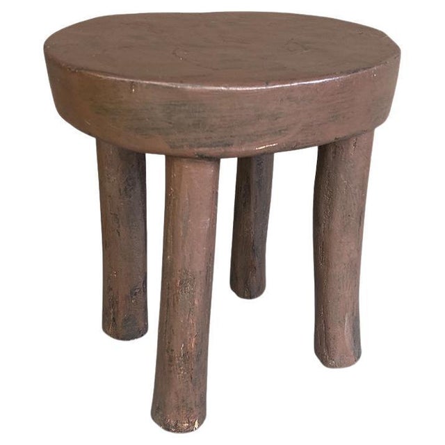 Antique African side table or stool hand carved from a single block of wood. This side table or stool was sourced in the...