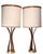 Sculptural pair of Mid Century wood and brass table lamps, in very good, clean, working and ready to use condition. The...