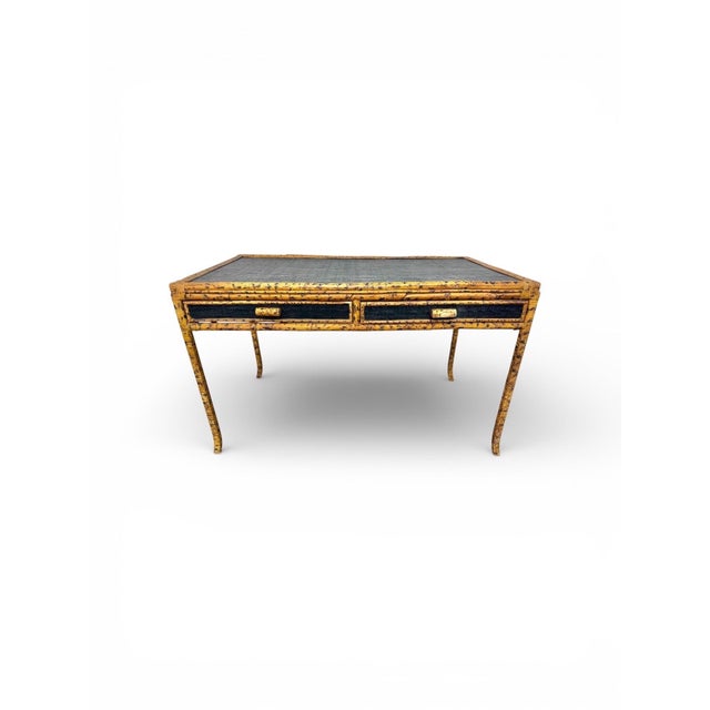 Striking vintage writing desk crafted in scorched bamboo with dramatic tortoiseshell pattern and elegant Asian-inspired...