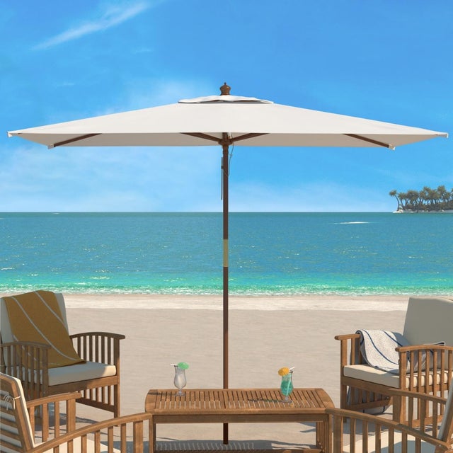 Create a stylish and shady retreat for any outdoor space with our Aklin market umbrella. Featuring a wide rectangular...