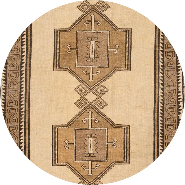 Vintage hand-knotted Persian Shiraz with a geometric design. This rug has magnificent detailing and would be perfect for...