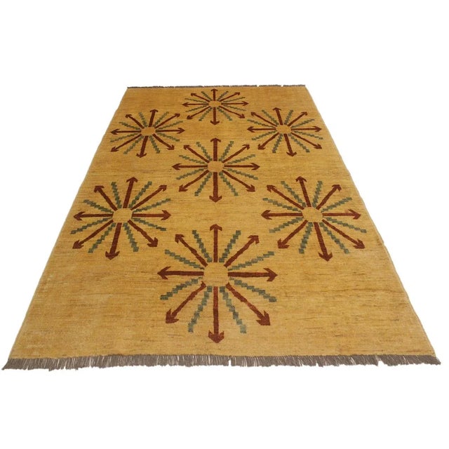 Add character and depth to a space by displaying this one-of-a-kind wool and silk rug. Made completely by hand, this...