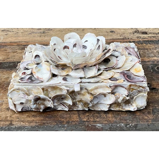 Embrace the timeless allure of the sea with this stunning vintage shell-encrusted keepsake box. A beautiful example of...
