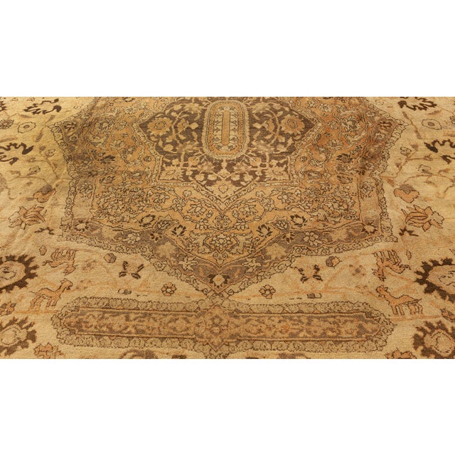 This magnificent Oversized Antique Indian Amritsar rug, crafted around 1900, embodies the grandeur and refinement of...