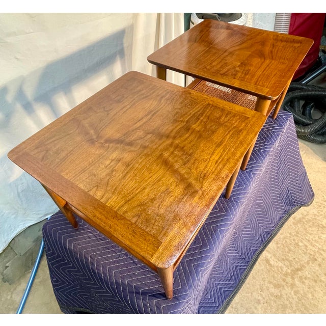 Elevate your space with this stunning pair of vintage Lane mid-century modern end tables — timeless pieces that blend...