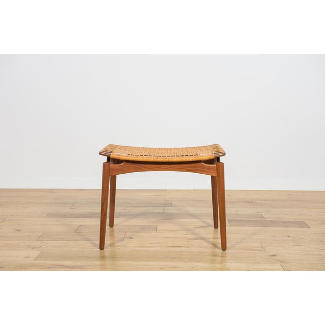 This is a Mid-Century Danish teak footstool by Sigfred Omann for Ølholm Møbelfabrik 1950s. The Stool is a beautiful,...