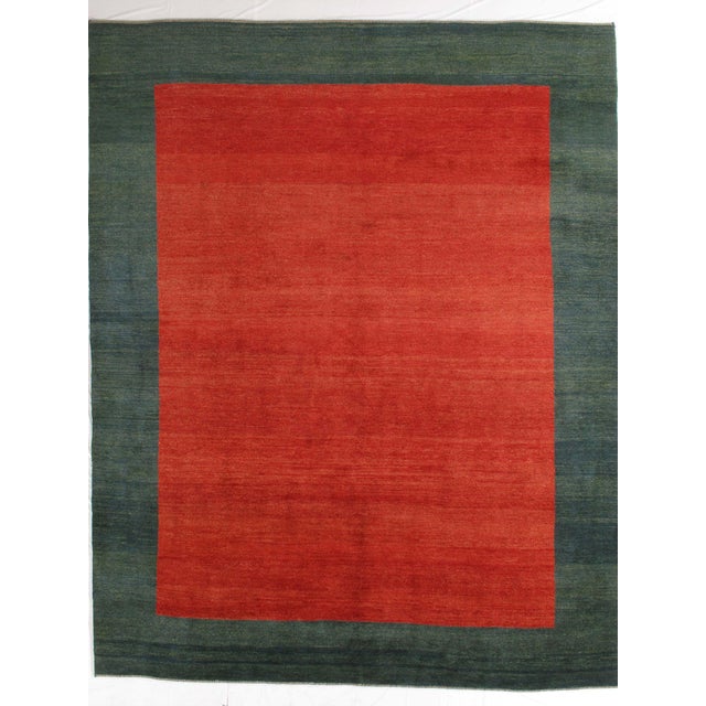 Vintage hand-knotted Persian Gabbeh rug featuring a bold, minimalist field with a contrasting border. Gabbeh rugs,...