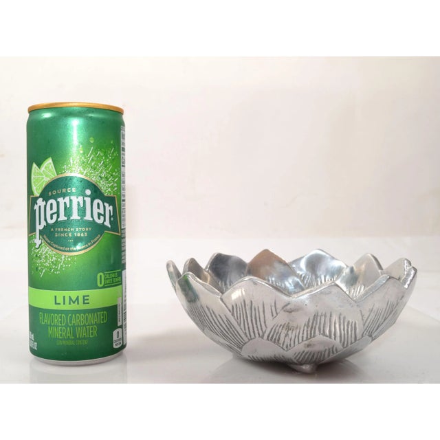 The Post Modern 2006 marked by Arthur Court round decorative Lotus bowl is made of sand cast aluminum. Delicate fretwork...