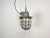 Industrial hanging lamp made in former Czechoslovakia during the 1960s. It features cast iron top, clear glass cover and...
