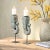 Dimensions: 5" W X 5" D X 22" H Step into a world where history and artistry meet with our Pair of Antique Peacock Carved...