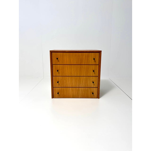 A simple and timelessly beautiful vintage chest of drawers in the mid-century style, dating from the 1960s. With its...
