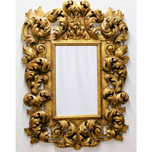 19th C Barqoue style bevel glass miror with heavy acanthus leaf and scrollwork decoration; 54"H 38"W 4.5"D