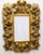 19th C Barqoue style bevel glass miror with heavy acanthus leaf and scrollwork decoration; 54"H 38"W 4.5"D