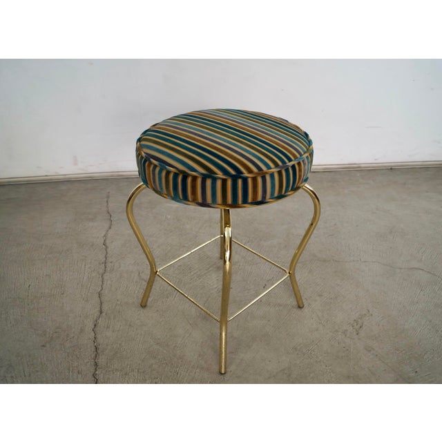 Vintage 1960's Mid century Modern brass vanity stool for sale. It was manufactured by Stanley Furniture, and was...