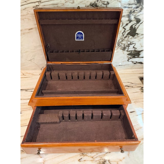 Gorgeous vintage solid wood flatware chest. Crafted with a rich warm finish highlighting the natural wood grain, this...
