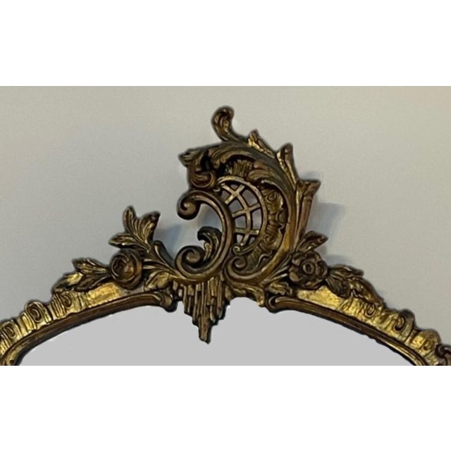 1900's Giltwood deeply detailed wood wall mirror.