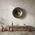 A monumental signed studio pottery raku bowl showcasing dramatic metallic bronze and silver crystalline glazing...