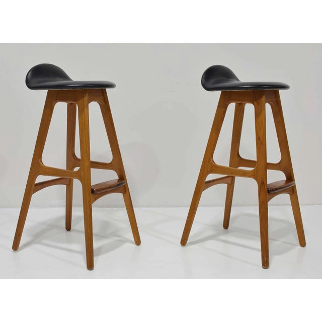 Danish industrial designer Erik Buch (pronounced Buck) was born in 1923 in Copenhagen. Buch used simple organic, smooth...