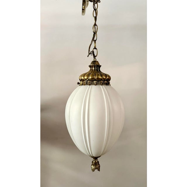 Hollywood Regency Vintage Hollywood Regency White Ribbed Glass Pendant Light With Brass-Finish Accents For Sale - Image 3 of 10