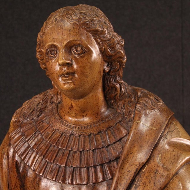 Great German sculpture from 18th century. Finely chiselled stone pine artwork depicting a subject of sacred art, a saint...
