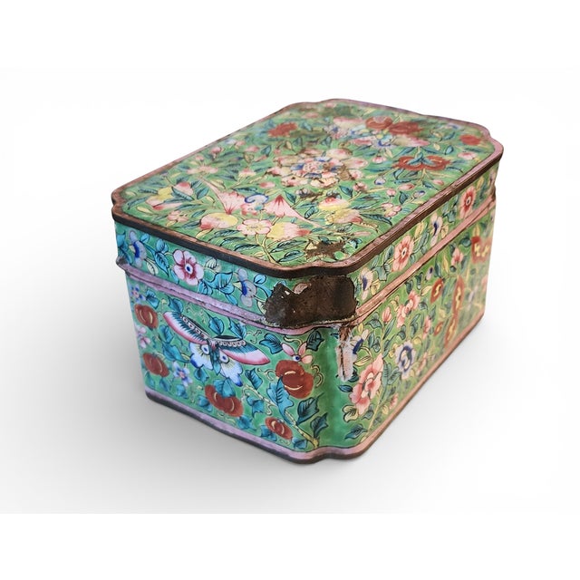 This is a heavily loved antique Chinese canton green enameled cloisonné lidded trinket box with bronze and brass edging....