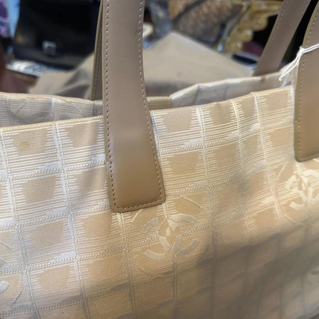 A 2003 Chanel New Travel Line Beige Nylon and Brown Leather Tote Bag For Sale - Image 12 of 15