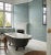 Whimsical and full of nostalgic charm symmetrical plant motifs are formally arranged over this wallpaper typical of the...