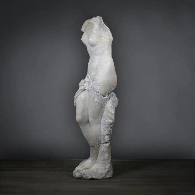 Draped Venus sculpture in white composite, a contemporary re-edition of a Roman statue known as the “Venus statue with...