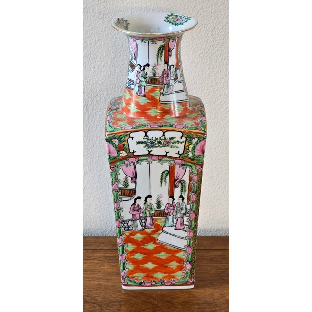 A captivating example of antique Chinese famille rose porcelain, this rare square-form vase is richly hand-painted in...
