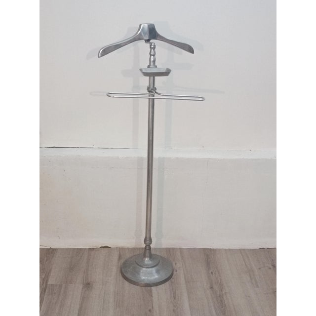 Beautiful valet stand. France, 1960s. Chrome-plated metal frame. At the top, a pretty hanger for a coat or jacket. Below,...