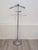 Beautiful valet stand. France, 1960s. Chrome-plated metal frame. At the top, a pretty hanger for a coat or jacket. Below,...