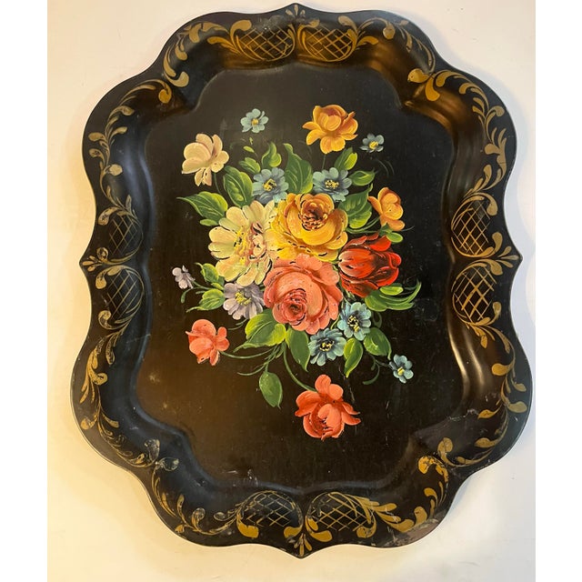A wonderful hand painted decorative floral tile tray from Philadelphia. Scalloped edges with old gold trim. In almost...