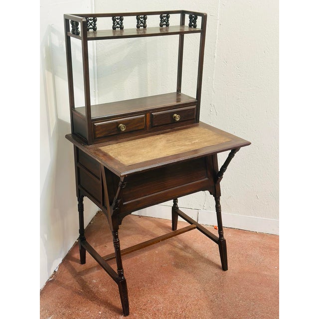 Antique Mahogany Writing Desk with Attached Bookcase – A beautifully crafted antique mahogany writing desk featuring a...