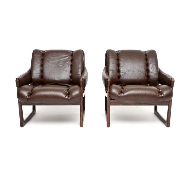 A stylish and extremely comfortable pair of vintage armchairs by Torbjorn Afdal for Bruksbo. They were made in Norway,...