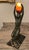 French art deco dark green patinated Egyptian themed lamp. Her title is L’Oasis and she is by Pierre Le Faguays using his...
