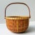 This beautifully handcrafted vintage Nantucket Lightship Basket is a signed piece, marked by the artisan on the underside....