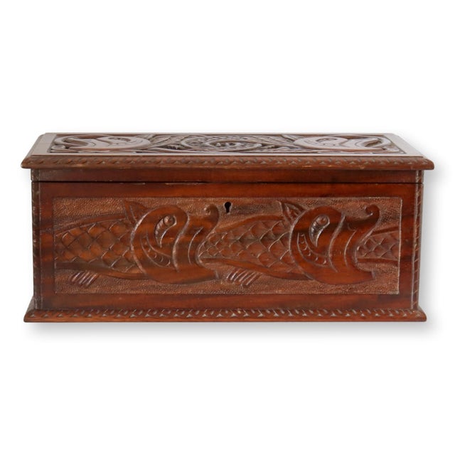 Antique English carved jewelry or storage box, a masterpiece of craftsmanship and design. Featuring a distinctive double...