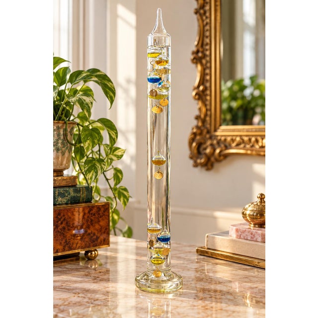 Vintage Dr. Friedrichs Gruppe Galileo Thermometer, made in Germany, presented with its original illustrated box. This...