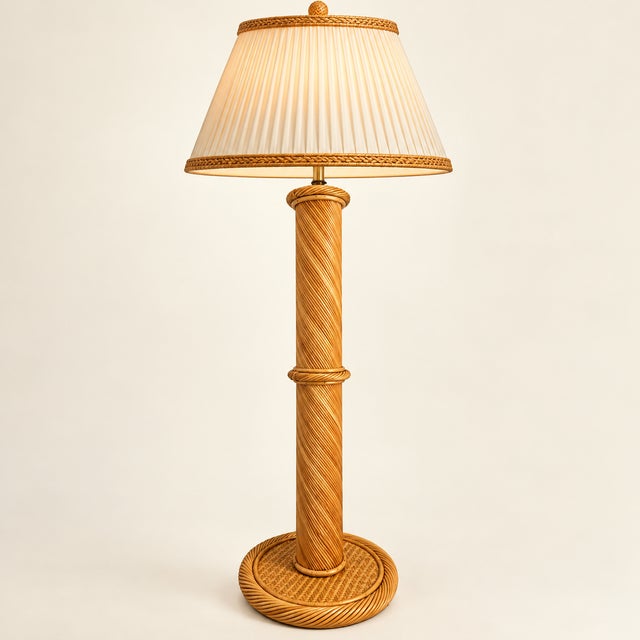 Pencil Reed floor lamp with woven wicker on base. It's a warm honey color, not copper, but system makes the seller check a...