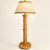 Pencil Reed floor lamp with woven wicker on base. It's a warm honey color, not copper, but system makes the seller check a...