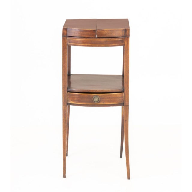 Victorian Flame Mahogany Wash Stand, with two-door lift top opening to central circular inset for basin and two circular...