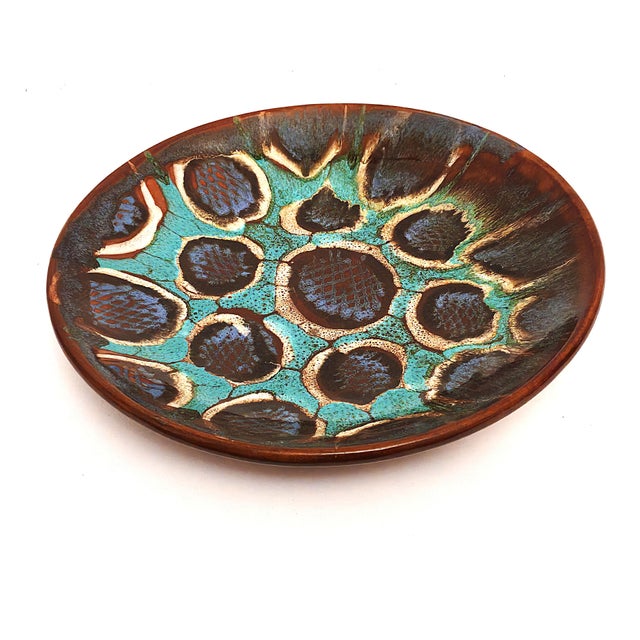 A plate/platter made by the "Kamionka" Ceramic Cooperative of Folk and Artistic Industry, Cepelia Group, in Łysa Góra, now...