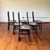 6 dining chairs with sleek, slim high-back design and upholstered seat. Vintage 1980s, Made in Italy.