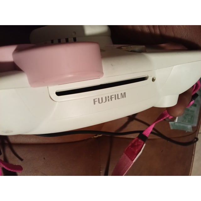 Hello kitty insta max Polaroid camera. Comes with extra package of film.