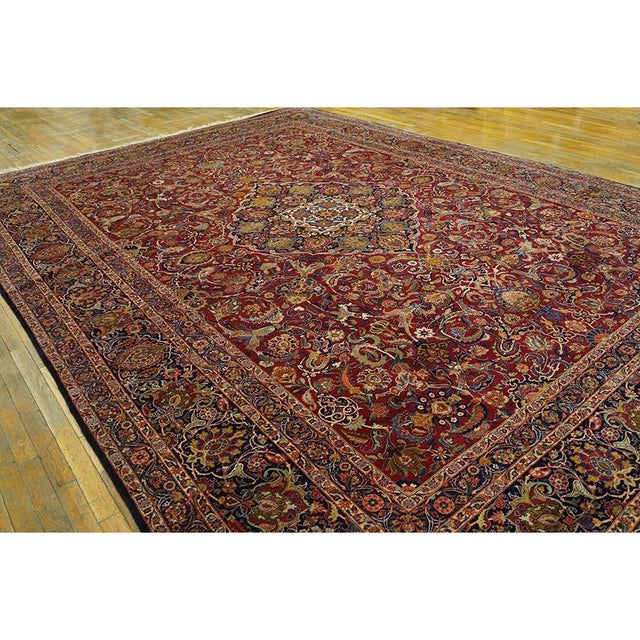 "This exquisite 1940 Antique Kashan Persian Formal rug showcases the master weaving traditions of Iran. Measuring 10' 6" x...
