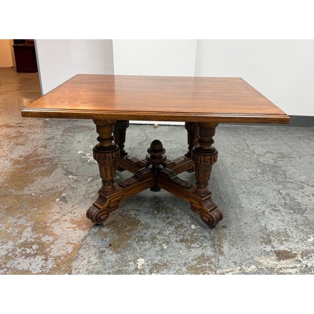 Design Plus Gallery presents an Antique Hand Carved Wood Base + Wood Top. This game table pairs an antique wood base with...
