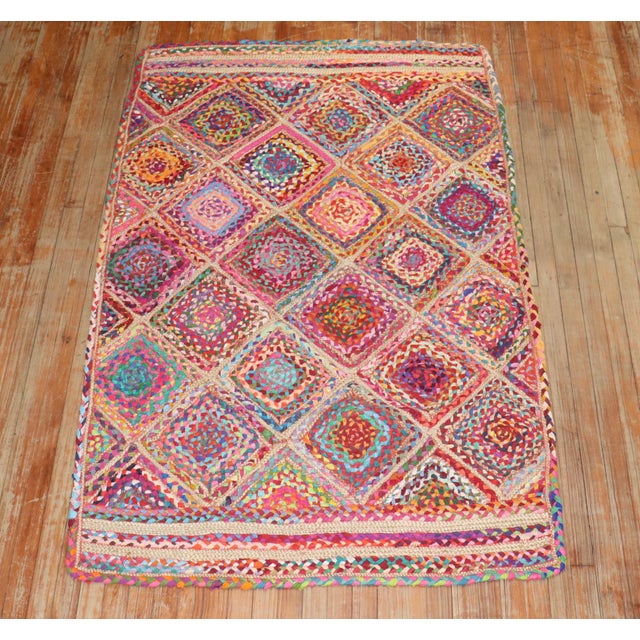 An accent size cheerful central asian braid rug from the 3rd quarter of the 20th century