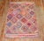 An accent size cheerful central asian braid rug from the 3rd quarter of the 20th century
