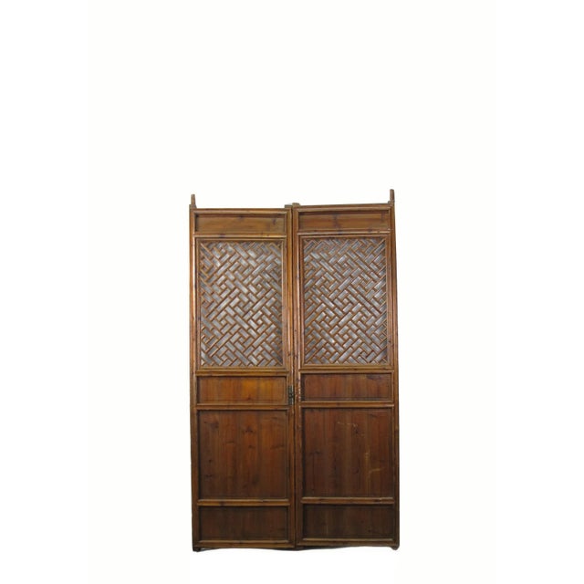 This pair antique Chinese screen door panels showcase handmade intricately designed lattice patterns. Each lattice panel...