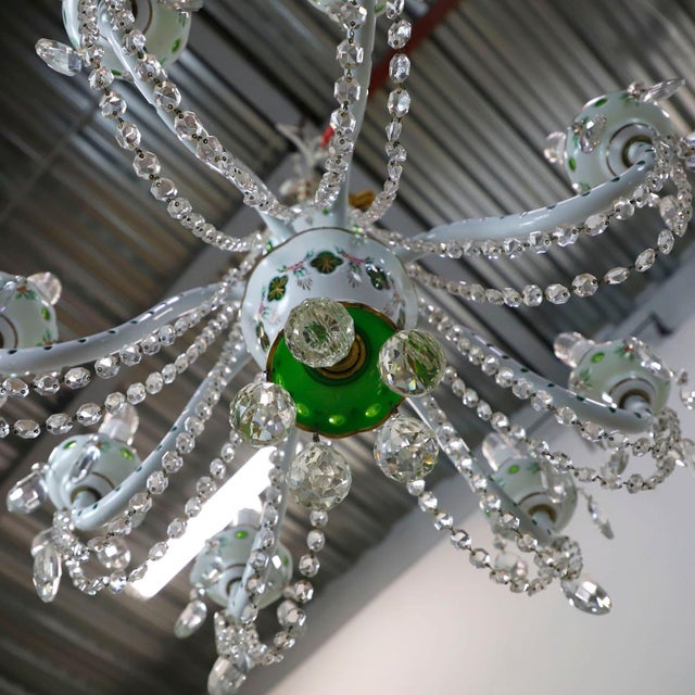 Circa 1960. We offer this Italian Antique Porcelain Basket Chandelier. Great vintage conditions and working at...